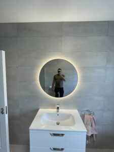 LED bathroom mirror installed by Carlow Handyman in a modern bathroom
