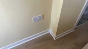 White scotia moulding installed around laminate flooring in Carlow and Tullow