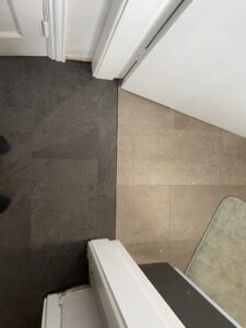 Clean transition between vinyl flooring and adjoining room